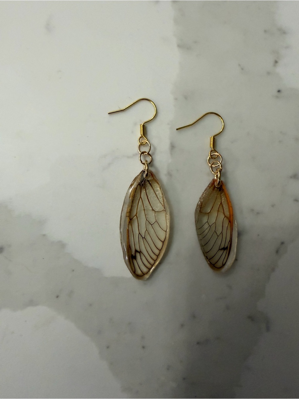 Handmade earrings made with real cicada wings